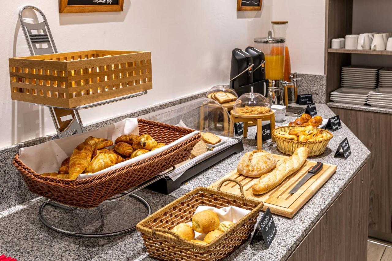 Fraser Suites Paris La Defense Курбевуа Екстер'єр фото A breakfast buffet at a hotel