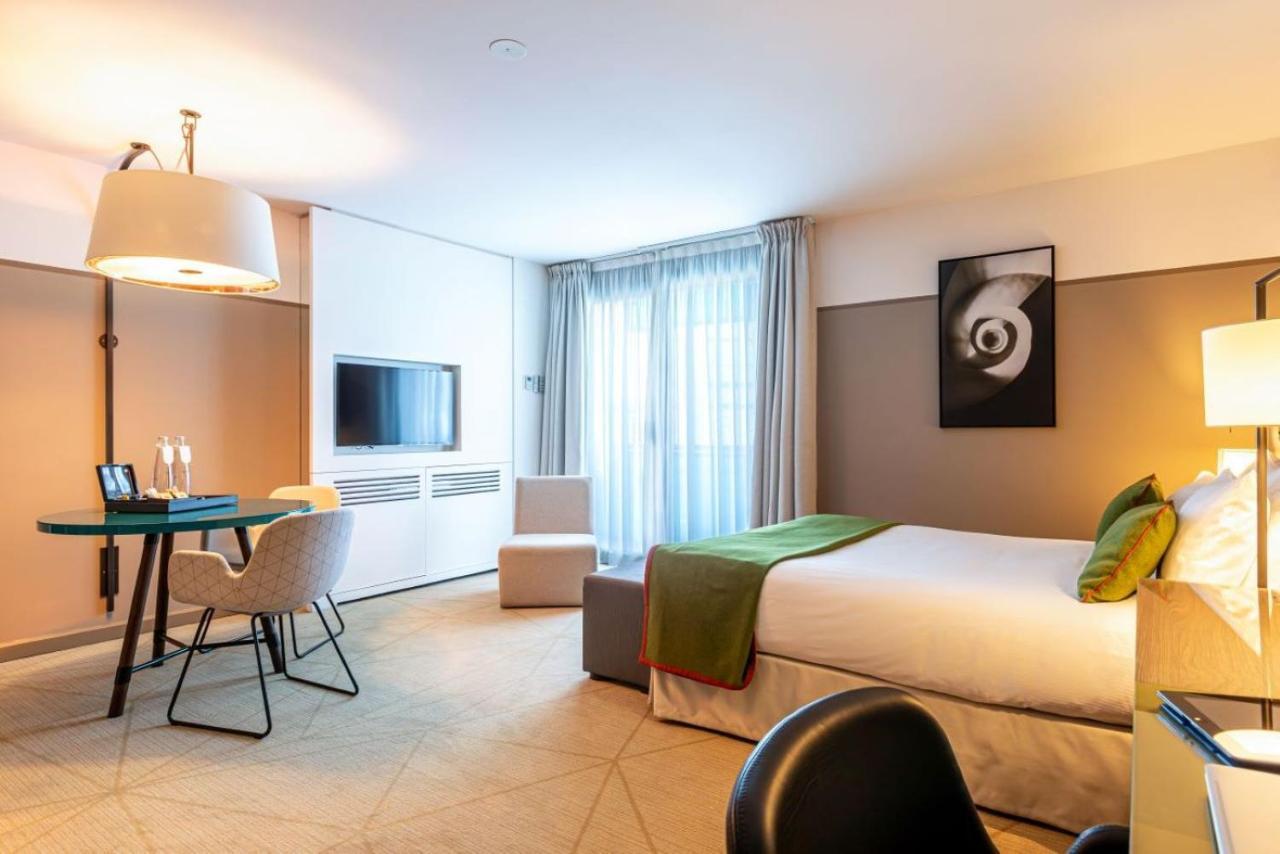 Fraser Suites Paris La Defense Курбевуа Екстер'єр фото A room at the hotel