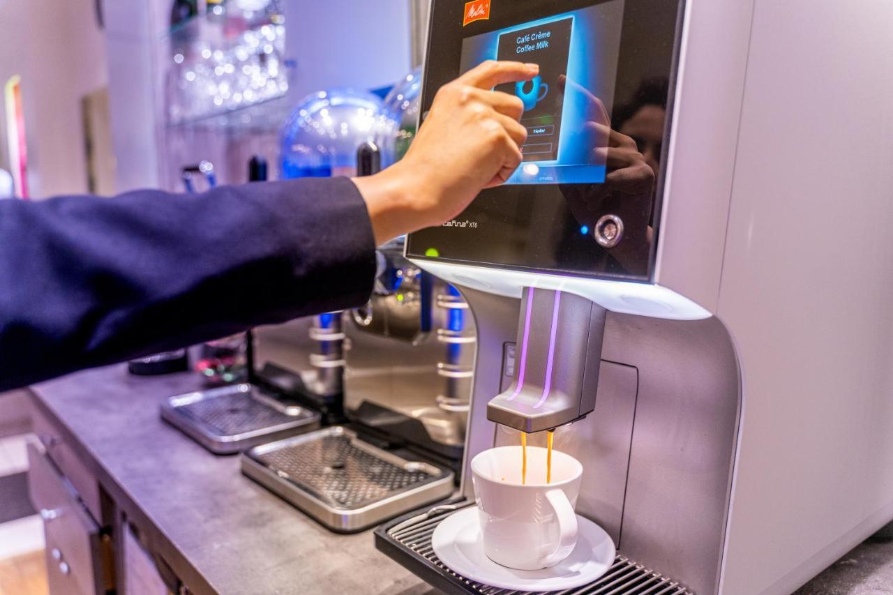 Fraser Suites Paris La Defense Курбевуа Екстер'єр фото A coffee machine